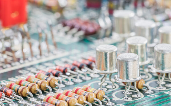 Condensers and Resistor assembly on the circuit board Closeup electronic hardware .Resistor and condensers assembly on the circuit board